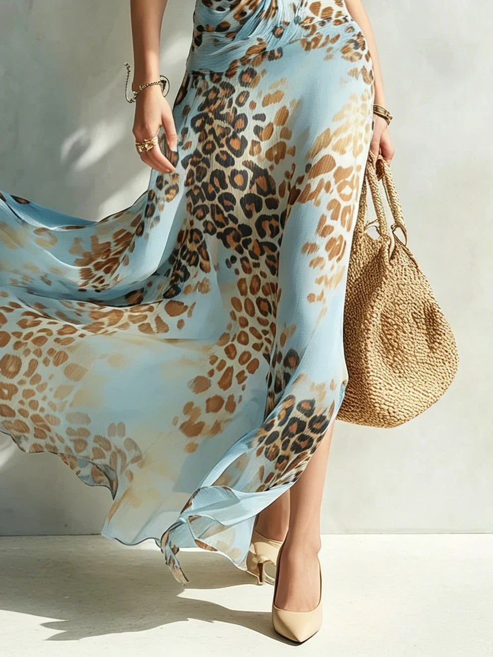 Eloria - Transparentes Neckholder-Maxikleid mit Leopardenmuster