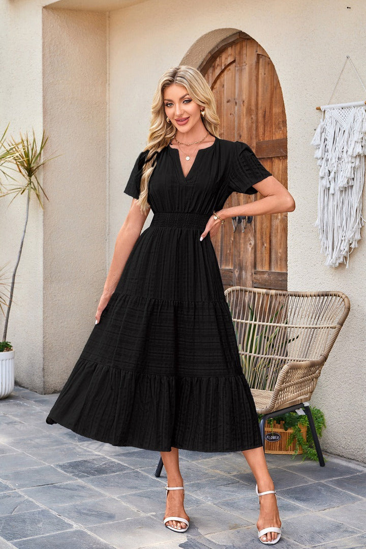 Astrelle - Strukturiertes, gestuftes Maxikleid