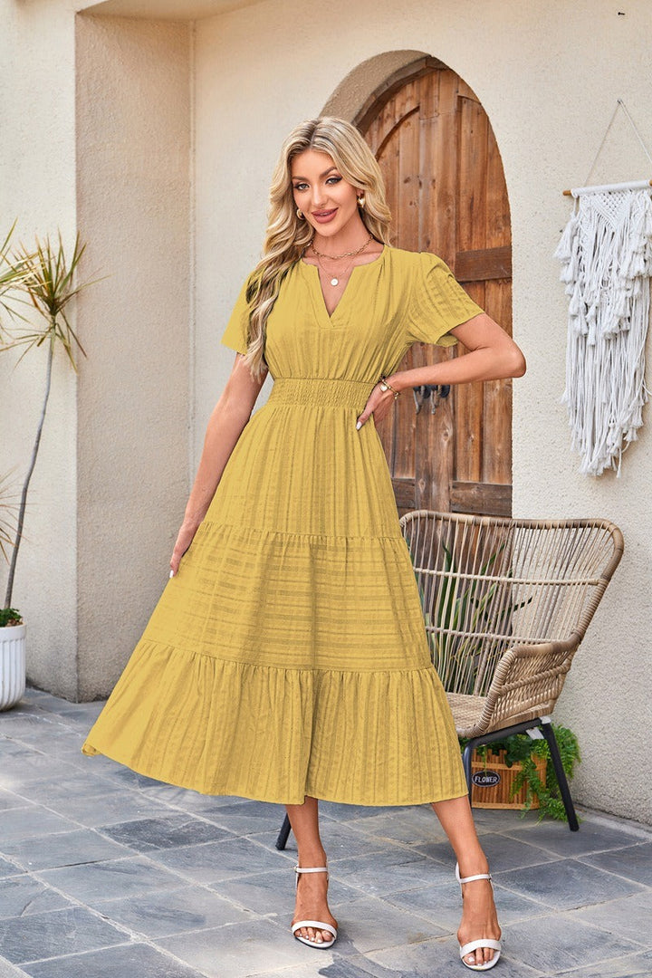 Astrelle - Strukturiertes, gestuftes Maxikleid
