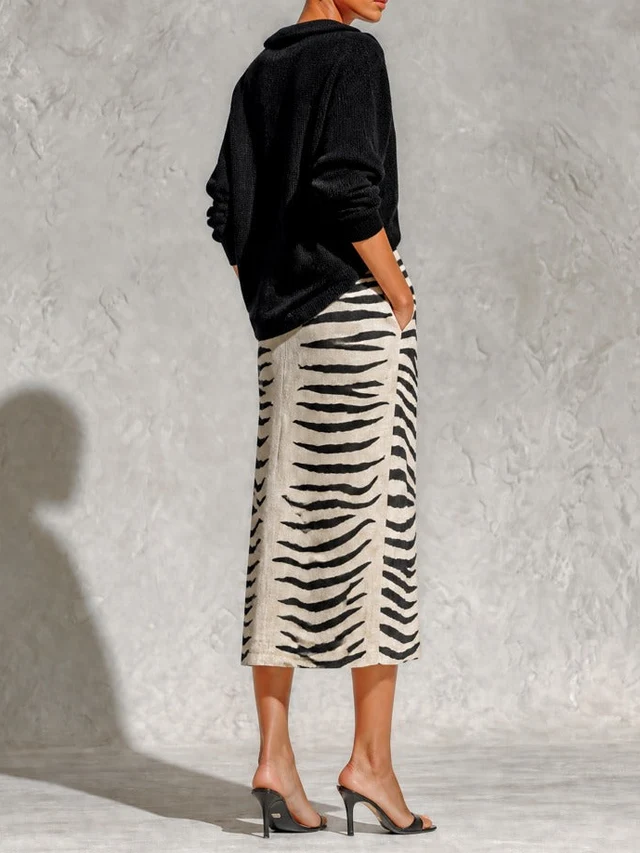 Aelyra - Strickpullover mit softem Griff & Midirock im Zebra-Print aus Leinen